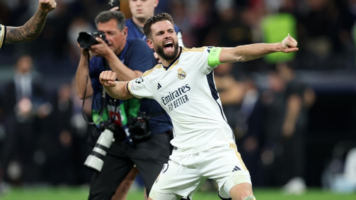 MADRID, SPAIN - MAY 08: Nacho Fernandez of Real Madrid celebrates after the team's victory and reaching the UEFA Champions League Final following the UEFA Champions League semi-final second leg match between Real Madrid and FC Bayern München at Estadio Santiago Bernabeu on May 08, 2024 in Madrid, Spain. (Photo by Clive Brunskill/Getty Images)