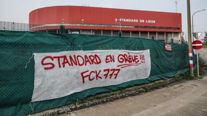 (FILES) This photograph shows a banner which reads "Standard on Strike, fck 777" during a protest of supporters of Standard de Liege, outside the Maurice Dufrasne Stadium in Liege, on May 10, 2024. (Photo by BRUNO FAHY / Belga / AFP) / Belgium OUT