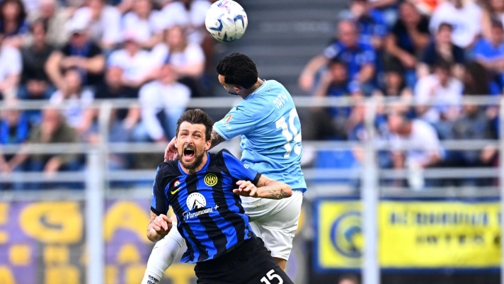 MILAN, ITALY - MAY 19: Francesco Acerbi of Inter competes for the ball with Valentin Castellanos of Lazio during the Serie A TIM match between FC Internazionale and SS Lazio at Stadio Giuseppe Meazza on May 19, 2024 in Milan, Italy. (Photo by Mattia Ozbot - Inter/Inter via Getty Images)