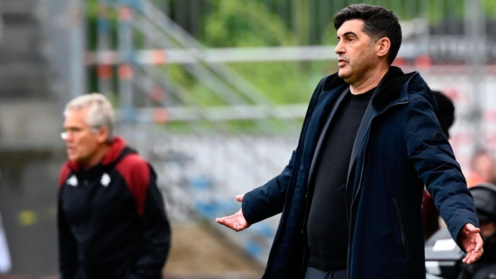 Lille's Portuguese head coach Paulo Fonseca (R) and Metz's Romanian head coach Laszlo Boloni (L) react during the French L1 football match between FC Metz and Lille LOSC at the Saint-Symphorien stadium in Longeville-les-Metz, eastern France, on April 28, 2024. (Photo by Jean-Christophe VERHAEGEN / AFP)
