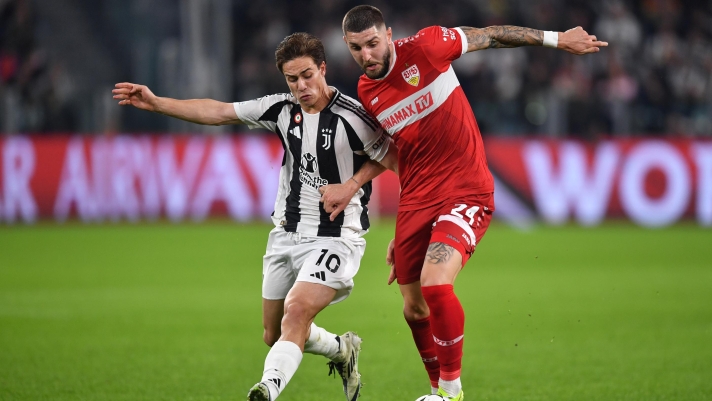 TURIN, ITALY - OCTOBER 22: Kenan Yildiz of Juventus and Jeff Chabot of VfB Stuttgart during the UEFA Champions League 2024/25 League Phase MD3 match between Juventus and VfB Stuttgart at Juventus Stadium on October 22, 2024 in Turin, Italy. (Photo by Valerio Pennicino/Getty Images)