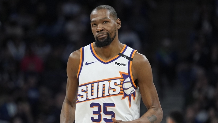 Phoenix Suns forward Kevin Durant jogs down the court during the second half of an NBA basketball game against the Minnesota Timberwolves, Friday, March 28, 2025, in Minneapolis. (AP Photo/Abbie Parr)