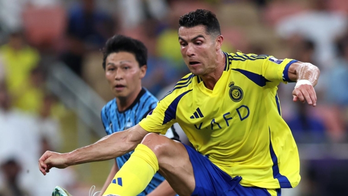 JEDDAH, SAUDI ARABIA - APRIL 30: Cristiano Ronaldo of Al Nassr controls the ball whilst under pressure from Yuichi Maruyama of Kawasaki Frontale during the AFC Champions League Elite Semi Final between Al Nassr and Kawasaki Frontale at King Abdullah Sports City Hall Stadium on April 30, 2025 in Jeddah, Saudi Arabia. (Photo by Yasser Bakhsh/Getty Images)