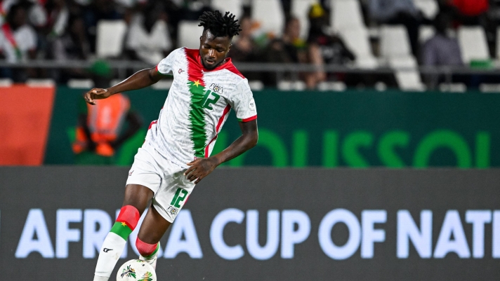 Burkina Faso's defender #12 Edmond Tapsoba runs with the ball during the Africa Cup of Nations (CAN) 2024 group D football match between Angola and Burkina Faso at Stade Charles Konan Banny in Yamoussoukro on January 23, 2024. (Photo by Issouf SANOGO / AFP)