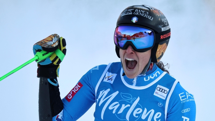 Italy's Federica Brignone celebrates at the finish area of a women's World Cup giant slalom, in Kronplatz, Italy, Tuesday, Jan. 20, 2026. (AP Photo/Marco Trovati)