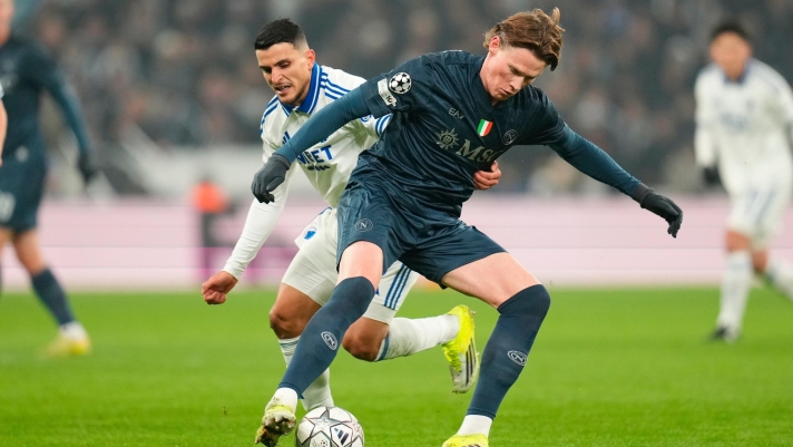 FC Copenhagen's Mohamed Elyounoussi, left, and Napoli's Scott McTominay battle for the ball during the Champions League group stage soccer match between FC Copenhagen and Napoli in Copenhagen, Tuesday, Jan. 20, 2026. (Liselotte Sabroe/Ritzau Scanpix via AP)