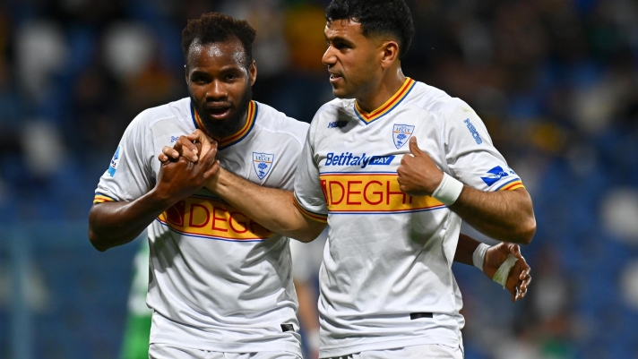 SASSUOLO, ITALY - MAY 17: Walid Cheddira of US Lecce celebrates scoring his team's second goal with teammate Lassana Coulibaly during the Serie A match between US Sassuolo Calcio and US Lecce at Mapei Stadium Citta del Tricolore on May 17, 2026 in Sassuolo, Italy. (Photo by Alessandro Sabattini/Getty Images)