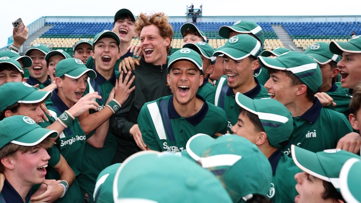 MONTE-CARLO, MONACO - APRIL 12: Jannik Sinner of Italy celebrates with ball girls and boys after victory against Carlos Alcaraz of Spain during the Men's Singles Final during day eight of the Rolex Monte-Carlo Masters at Monte-Carlo Country Club on April 12, 2026 in Monte-Carlo, Monaco. (Photo by Julian Finney/Getty Images)