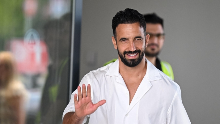 Italian football club AC Milan's newly recruited Portuguese coach Ruben Amorim waves upon his arrival at Linate Airport in Milan on July 6, 2026. (Photo by Piero CRUCIATTI / AFP)