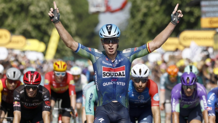 epa13104869 Belgian cyclist Tim Merlier of Soudal Quick-Step celebrates as he crosses the finish line to win Stage 8 of the Tour de France, a 180.4 km route from Perigueux to Bergerac, France, 11 July 2026.  EPA/YOAN VALAT