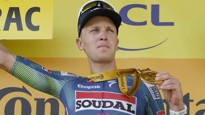 epa13104996 Belgian cyclist Tim Merlier of Soudal Quick-Step celebrates on the podium after winning Stage 8 of the Tour de France, a 180.4 km route from Perigueux to Bergerac, France, 11 July 2026.  EPA/YOAN VALAT