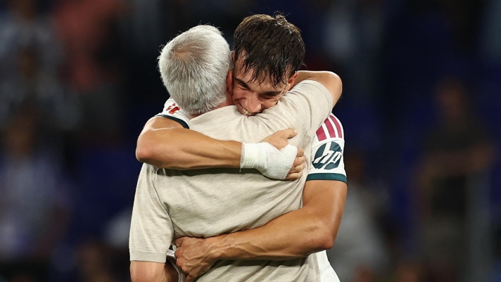 Real Madrid's Portuguese coach Jose Mourinho (L) celebrates with Real Madrid's Spanish forward #19 Carlos Espi Escrihuela at the end of the Spanish league football match between RCD Espanyol and Real Madrid CF at RCDE Stadium in Cornella de Llobregat on August 22, 2026. (Photo by Josep LAGO / AFP)
