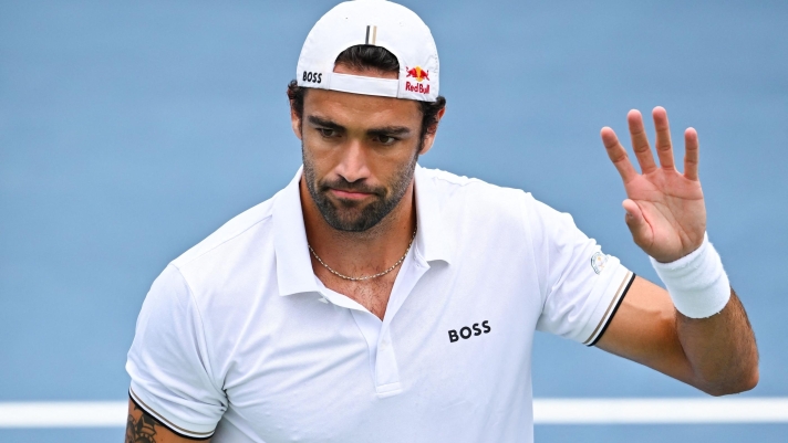 MONTREAL, CANADA - AUGUST 03: Mateo Berrettini of Italy salutes spectators during player introductions against Mariano Navone of Argentina ahead of their singles first round match on day two of the ATP 1000 National Bank Open presented by Rogers at Stade IGA on August 3, 2026 in Montreal, Quebec, Canada.   Minas Panagiotakis/Getty Images/AFP (Photo by Minas Panagiotakis / GETTY IMAGES NORTH AMERICA / Getty Images via AFP)