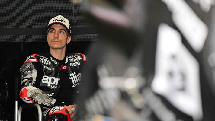 Aprilia Racing's Spanish rider Maverick Vinales sits in the pit on the first day of the pre-season MotoGP winter test at the Sepang International Circuit in Sepang on February 5, 2022. (Photo by Ahmad Fadali / AFP)