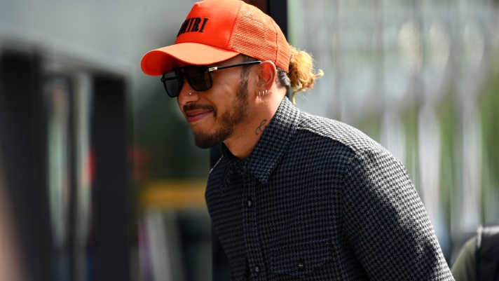 IMOLA, ITALY - APRIL 23: Lewis Hamilton of Great Britain and Mercedes walks in the Paddock prior to practice ahead of the F1 Grand Prix of Emilia Romagna at Autodromo Enzo e Dino Ferrari on April 23, 2022 in Imola, Italy. (Photo by Dan Mullan/Getty Images)