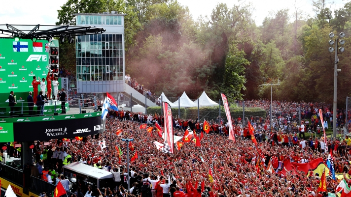 MONZA, ITALY - SEPTEMBER 08: A general view as race winner Charles Leclerc of Monaco and Ferrari celebrates on the podium with second placed Valtteri Bottas of Finland and Mercedes GP and third place Lewis Hamilton of Great Britain and Mercedes GP during the F1 Grand Prix of Italy at Autodromo di Monza on September 08, 2019 in Monza, Italy. (Photo by Mark Thompson/Getty Images)