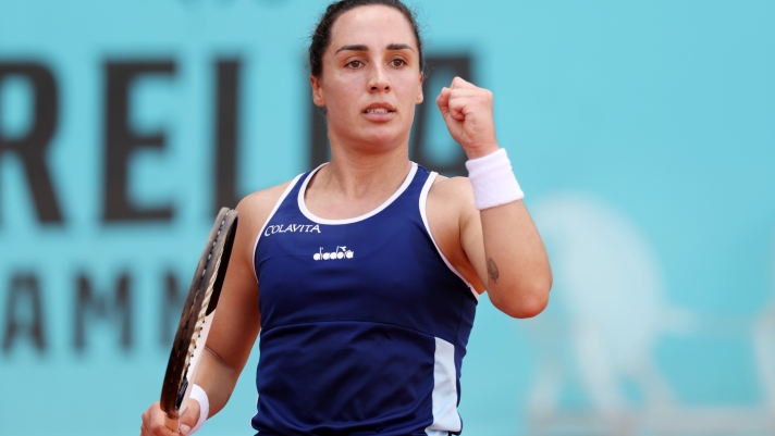 MADRID, SPAIN - APRIL 28: Martina Trevisan of Italy celebrates a point against Eugenie Bouchard of Canda during the Women's Singles second round match on Day Five of the Mutua Madrid Open at La Caja Magica on April 28, 2023 in Madrid, Spain. (Photo by Clive Brunskill/Getty Images)