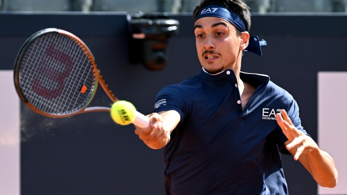 Lorenzo Sonego of Italy in action during his men's singles first round match against Jeremy Chardy of France (not pictured) at the Italian Open tennis tournament in Rome, Italy, 11 May 2023.  ANSA/ETTORE FERRARI