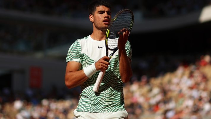 PARIS, FRANCE - MAY 31: Carlos Alcaraz of Spain reacts against Taro Daniel of Japan during the Men's Singles Second Round Match on Day Four of the 2023 French Open at Roland Garros on May 31, 2023 in Paris, France. (Photo by Julian Finney/Getty Images)