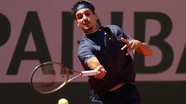 PARIS, FRANCE - JUNE 04: Lorenzo Sonego of Italy plays a forehand against Karen Khachanov during the Men's Singles Fourth Round match on Day Eight of the 2023 French Open at Roland Garros on June 04, 2023 in Paris, France. (Photo by Julian Finney/Getty Images)