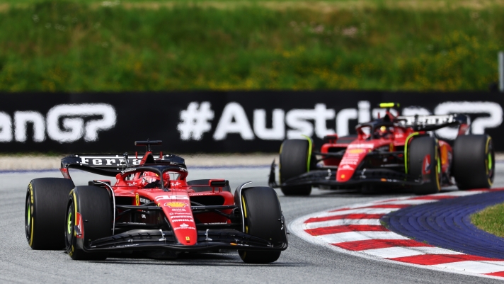 SPIELBERG, AUSTRIA - JULY 02: Charles Leclerc of Monaco driving the (16) Ferrari SF-23 leads Carlos Sainz of Spain driving (55) the Ferrari SF-23 on track during the F1 Grand Prix of Austria at Red Bull Ring on July 02, 2023 in Spielberg, Austria. (Photo by Clive Rose/Getty Images)