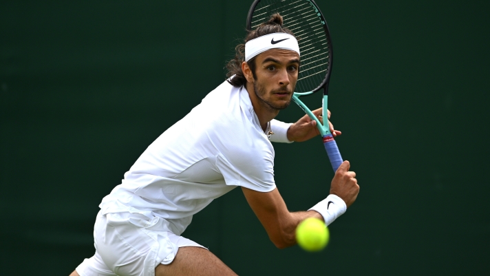 LONDON, ENGLAND - JULY 06: Lorenzo Musetti of Italy plays a backhand against Jaume Munar of Spain in the Men's Singles second round match during day four of The Championships Wimbledon 2023 at All England Lawn Tennis and Croquet Club on July 06, 2023 in London, England. (Photo by Shaun Botterill/Getty Images)