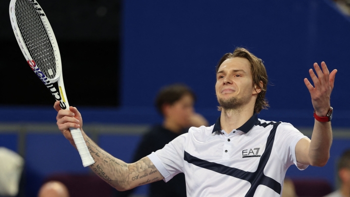 Kazakhstan's Alexander Bublik celebrates his victory after winning the ATP World Tour Open Sud de France final tennis match against Croatia's Borna Coric, in Montpellier, southern France, on February 4, 2024. (Photo by Pascal GUYOT / AFP)