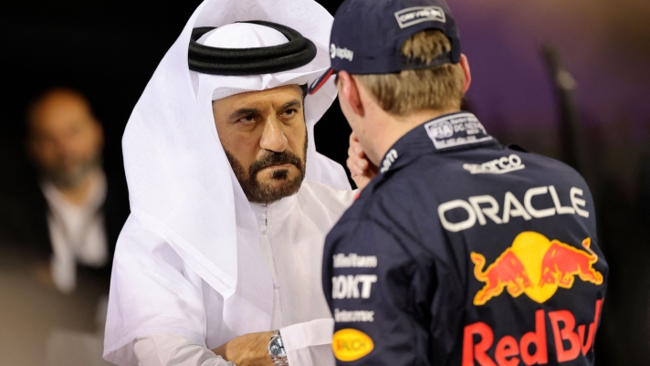 FIA president Mohammed bin Sulayem (L) speaks with Red Bull Racing's Dutch driver Max Verstappen after the qualifying session of the Bahrain Formula One Grand Prix at the Bahrain International Circuit in Sakhir on March 1, 2024. (Photo by Giuseppe CACACE / AFP)