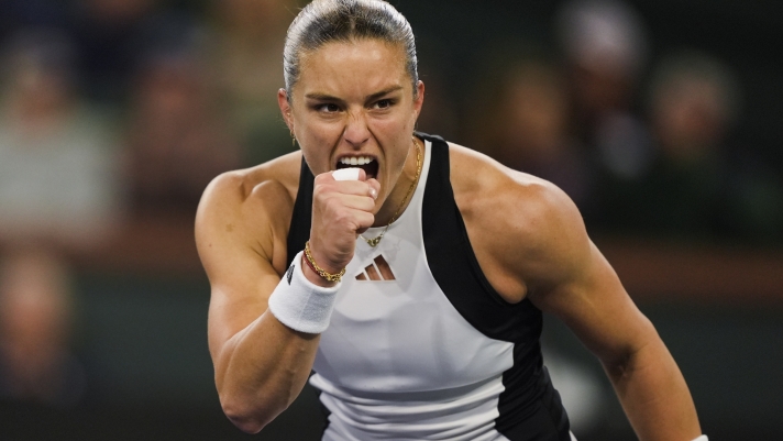Maria Sakkari, of Greece, celebrates winning a game over Coco Gauff, of the United States, during a semifinal match at the BNP Paribas Open tennis tournament in Indian Wells, Calif., Friday, March 15, 2024. (AP Photo/Ryan Sun)