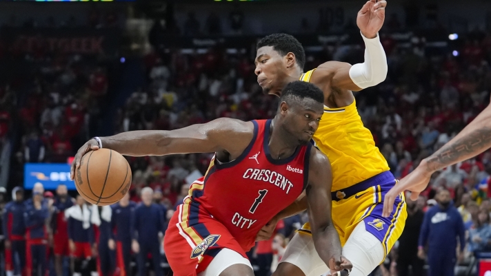 New Orleans Pelicans forward Zion Williamson (1) drives to the basket against Los Angeles Lakers forward Rui Hachimura in the second half of an NBA basketball play-in tournament game Tuesday, April 16, 2024, in New Orleans. The Lakers won 110-106. (AP Photo/Gerald Herbert)