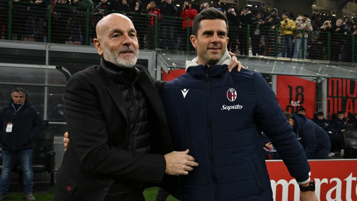 MILAN, ITALY - JANUARY 27: Head coach of AC Milan Stefano Pioli shakes hands with head coach of Bologna FC Thiago Motta during the Serie A TIM match between AC Milan and Bologna FC - Serie A TIM at Stadio Giuseppe Meazza on January 27, 2024 in Milan, Italy. (Photo by Claudio Villa/AC Milan via Getty Images)