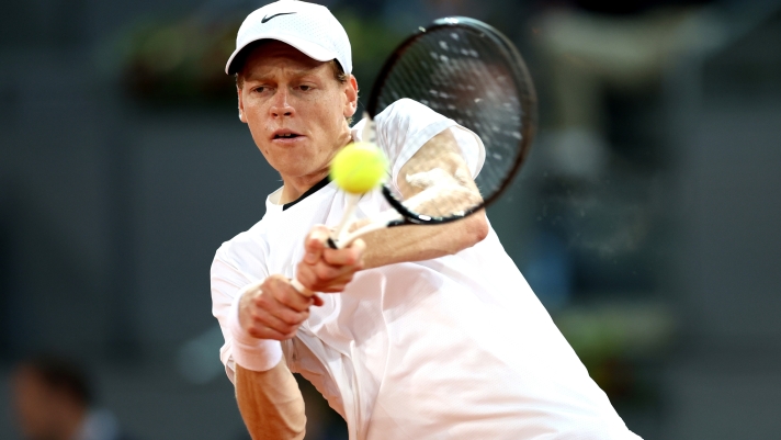 MADRID, SPAIN - APRIL 27: Jannik Sinner of Italy plays a backhand against Lorenzo Sonego of Italy in the Men's Singles Round of 64 match during Day Five of the Mutua Madrid Open at La Caja Magica on April 27, 2024 in Madrid, Spain. (Photo by Clive Brunskill/Getty Images)