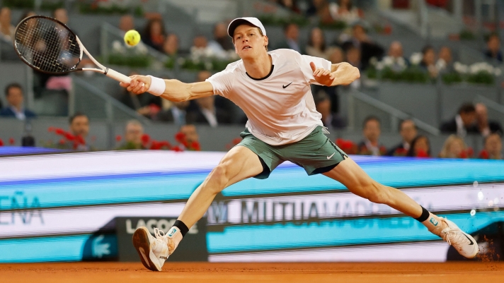 Italy's Jannik Sinner returns the ball to Russia's Pavel Kotov during the third round of the 2024 ATP Tour Madrid Open tournament tennis match at Caja Magica in Madrid on April 29, 2024. (Photo by OSCAR DEL POZO / AFP)