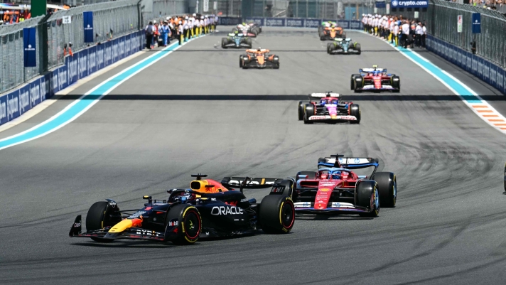 Red Bull Racing's Dutch driver Max Verstappen leads Ferrari's Monegasque driver Charles Leclerc at the start of the 2024 Miami Formula One Sprint at Miami International Autodrome in Miami Gardens, Florida, on May 4, 2024. (Photo by Jim WATSON / AFP)