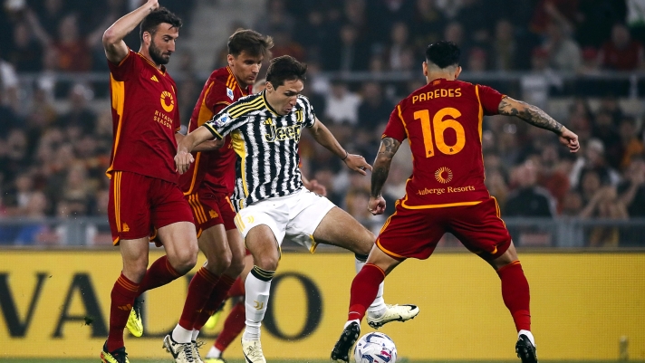 JuventusÕ Federico Chiesa (L) and Agostino Pennar (R) in action during the Italian Serie A soccer match AS Roma vs Juventus FC at Olimpico stadium in Rome, Italy, 05 May 2024. ANSA/ANGELO CARCONI