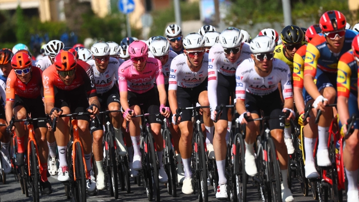 Pink Jersey Team UAE's Slovenian rider Tadej Pogacar rides in the pack during the 4th stage of the 107th Giro d'Italia cycling race, 190 km between Acqui Terme and Andora, on May 7, 2024 in Andora. (Photo by Luca Bettini / AFP)