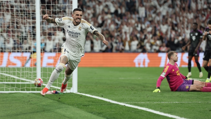 Real Madrid's Spanish forward #14 Joselu celebrates scoring his team's first goal during the UEFA Champions League semi final second leg football match between Real Madrid CF and FC Bayern Munich at the Santiago Bernabeu stadium in Madrid on May 8, 2024. (Photo by Thomas COEX / AFP)