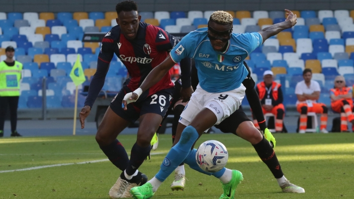 Bologna?s defender Jhon Lucumí (L) and  Napoli?s forward Victor Osimhen (R)  in action during the Italian Serie A soccer match between SSC Napoli  and Bologna FC  at ' Diego Armando Maradona' stadium in Naples , Italy,  11 May 2024. ANSA/CESARE ABBATE