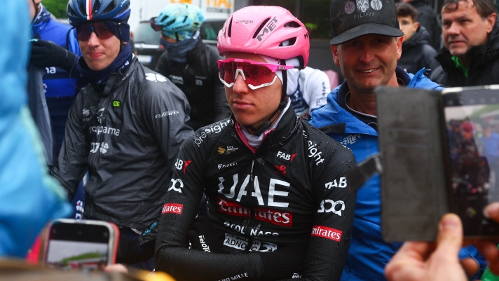 Team UAE's Slovenian rider Tadej Pogacar waits for the start of the race during the 16th stage of the 107th Giro d'Italia cycling race, 206km between Livigno and Santa Cristina Val Gardena on May 21, 2024. Due to bad weather condition, the route changed and the start takes place in Lasa. (Photo by Luca Bettini / AFP)