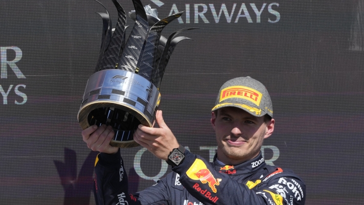 Red Bull driver Max Verstappen of the Netherlands celebrates his second place at the British Formula One Grand Prix race at the Silverstone racetrack, Silverstone, England, Sunday, July 7, 2024. (AP Photo/Luca Bruno)