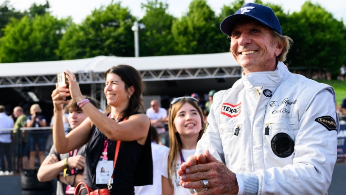 Brazilian former racing driver Emerson Fittipaldi takes part in the Legends Parade at the Red Bull Ring race track in Spielberg, Austria, on June 29, 2024, ahead of the Formula One Austrian Grand Prix. (Photo by MAX SLOVENCIK / APA / AFP) / Austria OUT