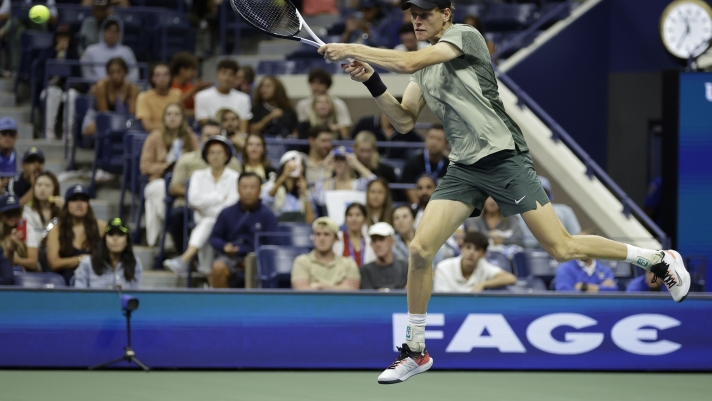 Jannik Sinner, of Italy, returns a shot to Tommy Paul, of the United States, during a fourth round match of the U.S. Open tennis championships, Monday, Sept. 2, 2024, in New York. (AP Photo/Adam Hunger)