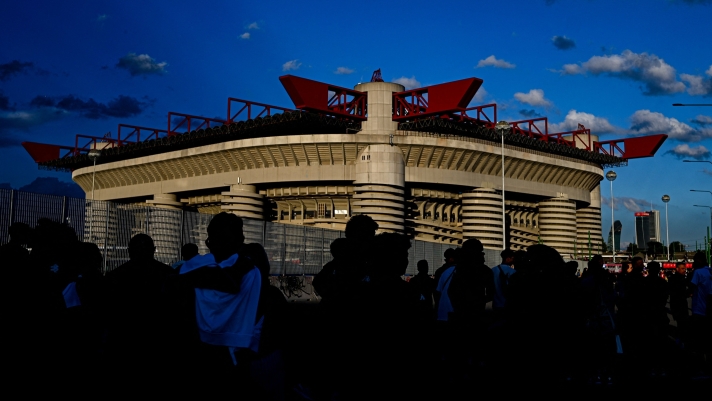 AC Milan's fans arrive prior to the Italian Serie A football match between AC Milan and Lecce at San Siro stadium in Milan, on September 27, 2024. (Photo by Gabriel BOUYS / AFP)