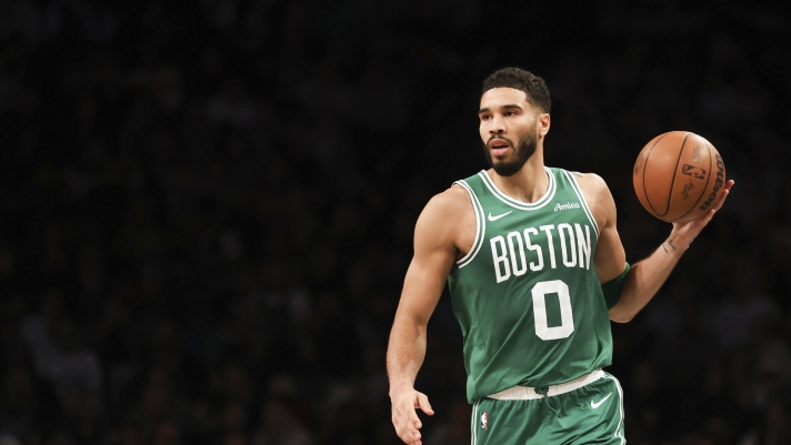 Boston Celtics' Jayson Tatum brings up the ball in the second half of an NBA basketball game against the Brooklyn Nets, Wednesday, Nov. 13, 2024, in New York. (AP Photo/Heather Khalifa)