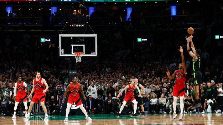 BOSTON, MA - NOVEMBER 16: Jayson Tatum #0 of the Boston Celtics hits the game winning shot over Ochai Agbaji #30 of the Toronto Raptorsin overtime to win the game at TD Garden on November 16, 2024 in Boston, Massachusetts. NOTE TO USER: User expressly acknowledges and agrees that, by downloading and/or using this Photograph, user is consenting to the terms and conditions of the Getty Images License Agreement. (Photo By Winslow Townson/Getty Images) (Photo by Winslow Townson / GETTY IMAGES NORTH AMERICA / Getty Images via AFP)