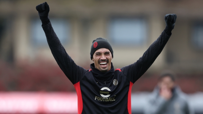 CAIRATE, ITALY - DECEMBER 22: Tijjani Reijnders of AC Milan smiles during a AC Milan training session at Milanello on December 22, 2024 in Cairate, Italy. (Photo by Claudio Villa/AC Milan via Getty Images)