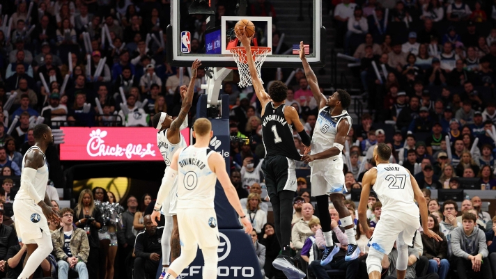 MINNEAPOLIS, MINNESOTA - DECEMBER 29: Victor Wembanyama #1 of the San Antonio Spurs dunks the ball against the Minnesota Timberwolves in the fourth quarter at Target Center on December 29, 2024 in Minneapolis, Minnesota. The Timberwolves defeated the Spurs 112-110. NOTE TO USER: User expressly acknowledges and agrees that, by downloading and or using this photograph, User is consenting to the terms and conditions of the Getty Images License Agreement.   David Berding/Getty Images/AFP (Photo by David Berding / GETTY IMAGES NORTH AMERICA / Getty Images via AFP)