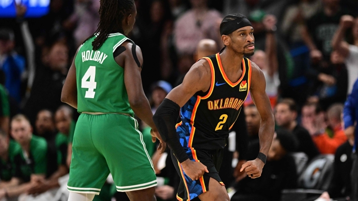 OKLAHOMA CITY, OKLAHOMA - JANUARY 5: Shai Gilgeous-Alexander #2 of the Oklahoma City Thunder flexes after a big play during the second half against the Boston Celtics at Paycom Center on January 5, 2025 in Oklahoma City, Oklahoma. NOTE TO USER: User expressly acknowledges and agrees that, by downloading and or using this photograph, User is consenting to the terms and conditions of the Getty Images License Agreement.   Joshua Gateley/Getty Images/AFP (Photo by Joshua Gateley / GETTY IMAGES NORTH AMERICA / Getty Images via AFP)