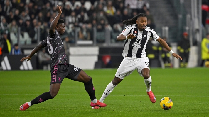 TURIN, ITALY - FEBRUARY 26: Khephren Thuram of Juventus is challenged by Ismael Konate of Empoli during the Coppa Italia Quarter Final match between Juventus and Empoli at Allianz Stadium on February 26, 2025 in Turin, Italy. (Photo by Filippo Alfero - Juventus FC/Juventus FC via Getty Images)