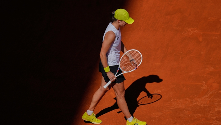 Iga Swiatek of Poland reacts during her match against United States' Coco Gauff during the Madrid Open tennis tournament in Madrid, Spain, Thursday, May 1, 2025. (AP Photo/Manu Fernandez)